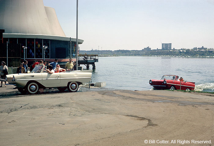 Cars driving out of lake